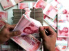Китай резко девальвировал юань